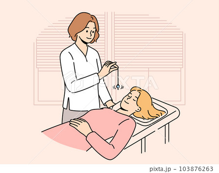 Psychiatrist hypnotizes female patient to treat psychological problems caused by difficult childhood 103876263