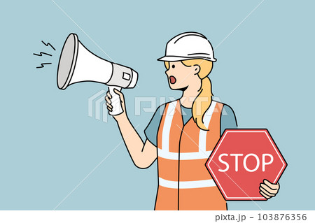 Female builder with megaphone and stop sign  103876356