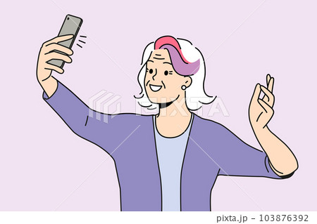 Happy elderly woman make selfie on cellphone Happy elderly woman make selfie on cellphone 103876392