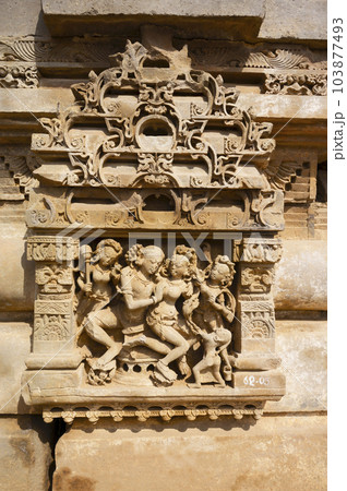 Carved stone idols on the outer wall of The Harshat Mata Temple, a Hindu temple dedicated to a goddess Harshat Mata, Abhaneri, Rajasthan, India Carved stone idols on the outer wall of The Harshat Mata Temple, a Hindu temple dedicated to a goddess Harshat Mata, Abhaneri, Rajasthan, India 103877493