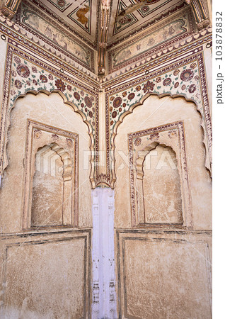 Colourful paintings on the inner wall of Shri Raghunath Ji Ka Bada Mandir, located in Mahansar, Shekhawati, Rajasthan, India 103878832