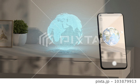Earth planet hologram stand on table phone display augmented reality Earth planet hologram stand on table phone display augmented reality 103879913