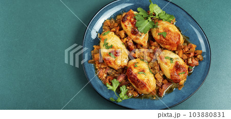 Grilled stuffed squid in salsa sauce Grilled stuffed squid in salsa sauce 103880831