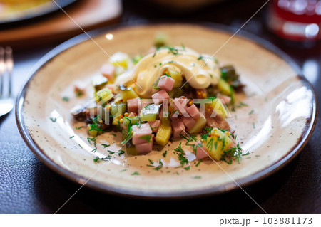 Salad with potatoes, sour cream and mushrooms 103881173
