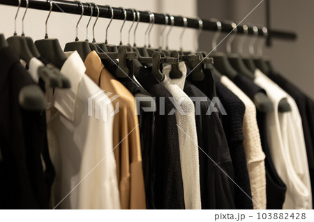 Casual women's clothing in discreet shades on a hanger Casual women's clothing in discreet shades on a hanger 103882428