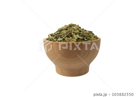 Dried leaves o Lemon verbena in latin Aloysia citrodora in wooden bowl isolated on white background. Medicinal herb. 103882550