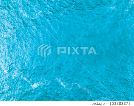 Nature Sea surface aerial view,Bird eye view photo of turquoise waves and water surface texture,Blue sea background Beautiful nature Amazing view sea background 103882872