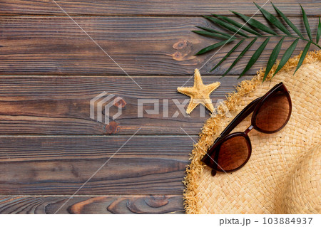 Summer vacation concept flat lay. beach accessories and towel top view. Space for text. travel concept Summer vacation concept flat lay. beach accessories and towel top view. Space for text. travel concept 103884937