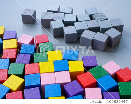 Multi-colored cubes opposite gray ones. Diversity concept. Multi-colored cubes opposite gray ones. Diversity concept. 103886447