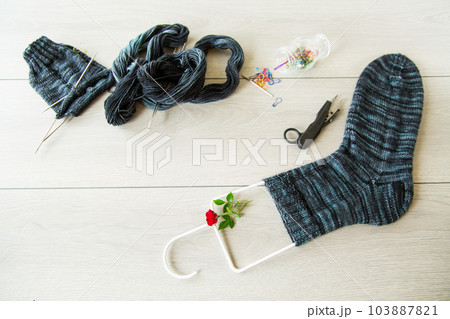 Set for hand knitting warm winter socks made of natural woolen yarn. Set for hand knitting warm winter socks made of natural woolen yarn. 103887821