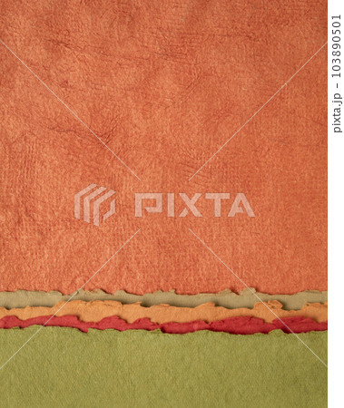 abstract landscape in red, orange and green - collection of Huun papers handmade in Mexico, vertical background abstract landscape in red, orange and green - collection of Huun papers handmade in Mexico, vertical background 103890501