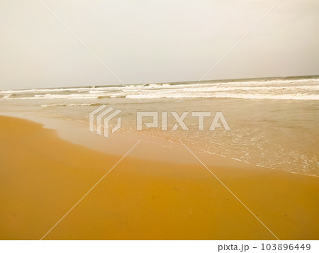 Amazing surf wave on a sea beach Amazing surf wave on a sea beach 103896449
