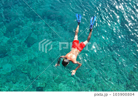 Snorkeling man Snorkeling man 103900804