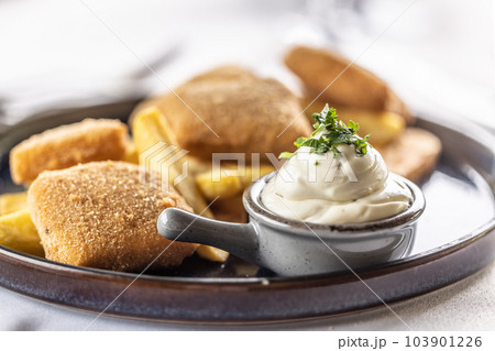 Fresh homemade mayonnaise as typical side of fried food such as chicken, cheese or chips 103901226