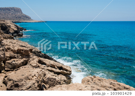 Waves crushing rocky coastline Waves crushing rocky coastline 103901429