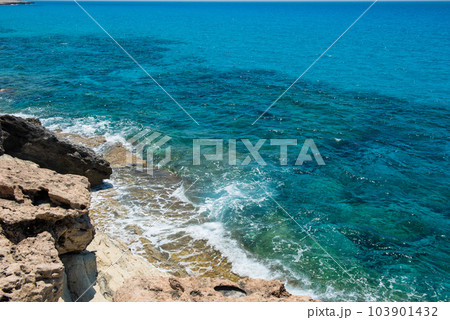 Waves crushing rocky coastline Waves crushing rocky coastline 103901432