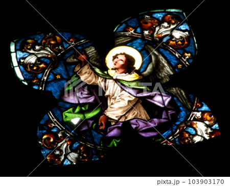 Stained glass window detail with Biblical scene 103903170
