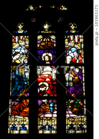 Stained glass window detail with Biblical scene 103903171