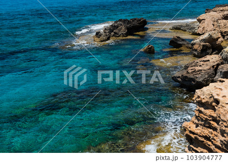 Sea caves near Ayia Napa, Mediterranean sea coast, Cyprus Sea caves near Ayia Napa, Mediterranean sea coast, Cyprus 103904777