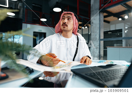 Young successful arab businessman working in the office 103909501