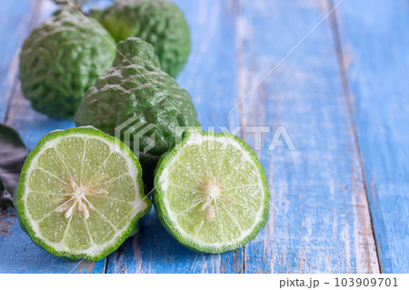 Close up bergamot on wooden table background. Close up bergamot on wooden table background. 103909701