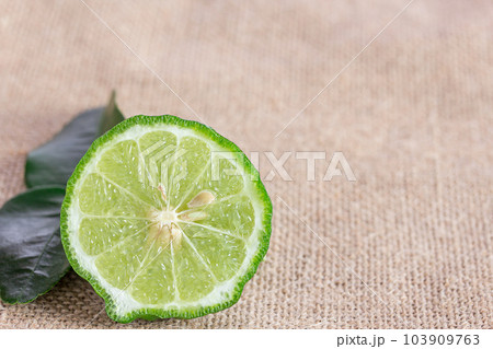 Close up bergamot on wooden table background. 103909763