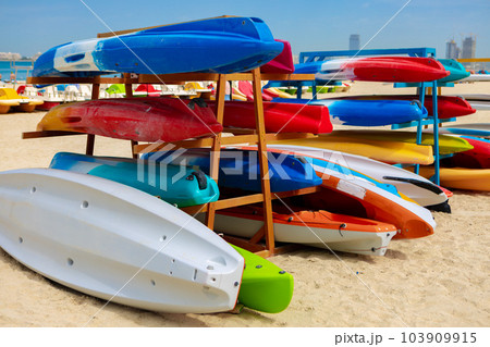 Surfboards stacked on the rack on a beach Surfboards stacked on the rack on a beach 103909915