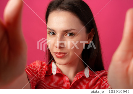 Close up of young beautiful woman taking selfie Close up of young beautiful woman taking selfie 103910943