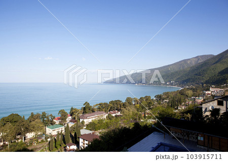 Picturesque top view of Gagra, sea and mountains. Gagra. Republic of Abkhazia Picturesque top view of Gagra, sea and mountains. Gagra. Republic of Abkhazia 103915711