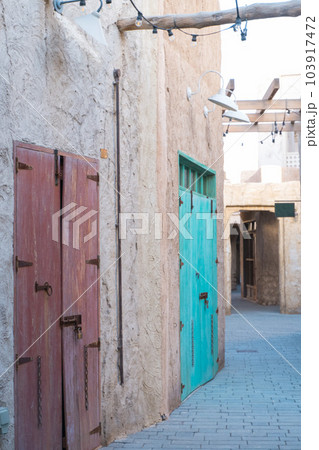 Arabic style carved wooden doors in Al Fahidi Historical District, Deira, Dubai, United Arab Emirates Arabic style carved wooden doors in Al Fahidi Historical District, Deira, Dubai, United Arab Emirates 103917472