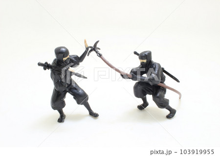 a Japanese ninja figurine on white background a Japanese ninja figurine on white background 103919955