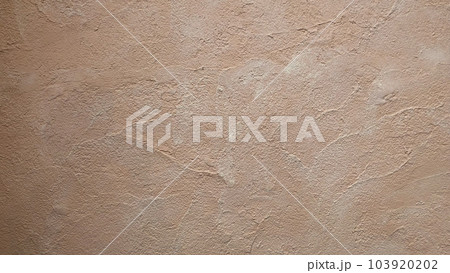 ベージュの漆喰壁の背景　テクスチャ 103920202