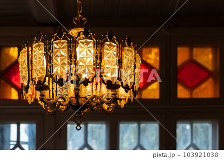 Luxury vintage chandelier with shiny crystal glass decoration. Close up 103921038