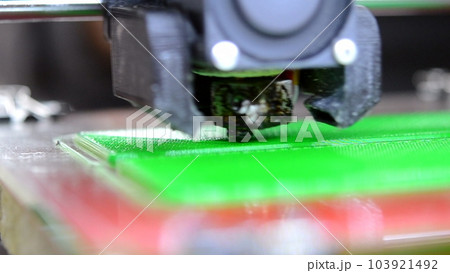 3D printer. Working 3d printer close-up. 3d printer printing object from molten plastic. Printing prototype. New modern printing technology on 3D printer. Additive progressive technologies. FDM 103921492