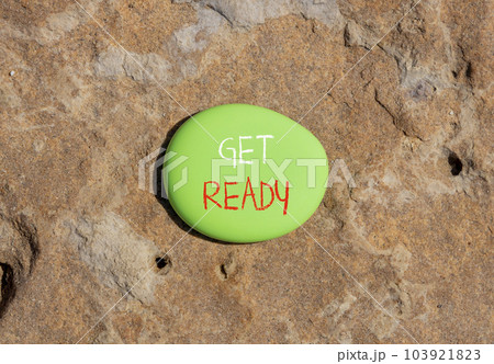 Get ready symbol. Concept words Get ready on beautiful green stone on a beautiful stone sea beach background. Business, support, motivation and get ready concept. Copy space. Get ready symbol. Concept words Get ready on beautiful green stone on a beautiful stone sea beach background. Business, support, motivation and get ready concept. Copy space. 103921823