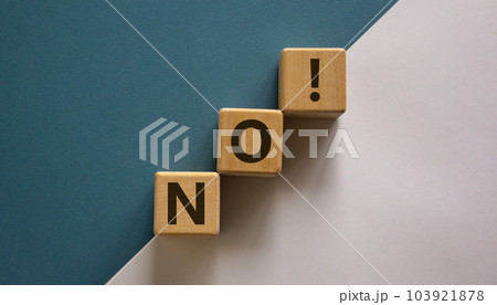 Wood blocks with word 'no' on beautiful white and blue background, copy space. Business concept. 103921878