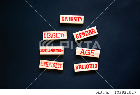 Diversity symbol. Diversity ethnicity gender age sexual orientation religion disability words written on wooden block. Beautiful black background. Equality and diversity concept. Copy space. 103921917