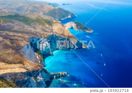 Aerial landscape from a drone. Azure sea water. Top view from a drone. Summer time for sea travel Aerial landscape from a drone. Azure sea water. Top view from a drone. Summer time for sea travel 103922718
