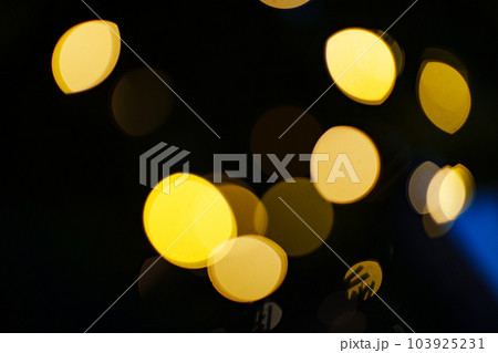 unfocused garland bulbs. Blur. the concept of Christmas decor. background. unfocused garland bulbs. Blur. the concept of Christmas decor. background. 103925231