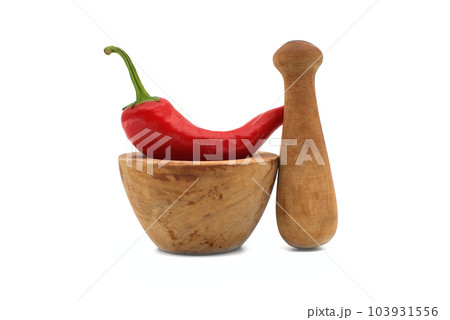 Red chili pepper and wooden pestle with mortar 103931556