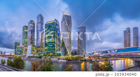 High buildings of Moscow-City at Moskva River at summer sunset, Russia. High buildings of Moscow-City at Moskva River at summer sunset, Russia. 103934040