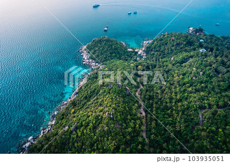 Island seascape Evening tropical island bird's eye view Island seascape Evening tropical island bird's eye view 103935051
