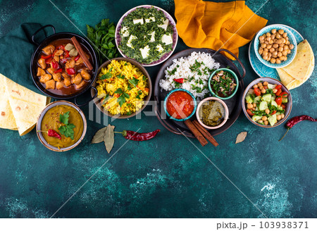 Assorted of traditional Indian food. 103938371