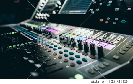Sound control music mixer in record studio. Close up mixer and equalizer volume on the mixer amplifier. Digital audio system Sound control music mixer in record studio. Close up mixer and equalizer volume on the mixer amplifier. Digital audio system 103939880