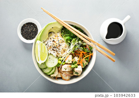 Poke bowl with silken tofu, rice and vegetables 103942633