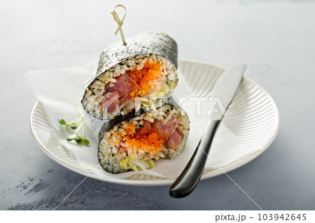 Sushi or poke burrito with nori Sushi or poke burrito with nori 103942645