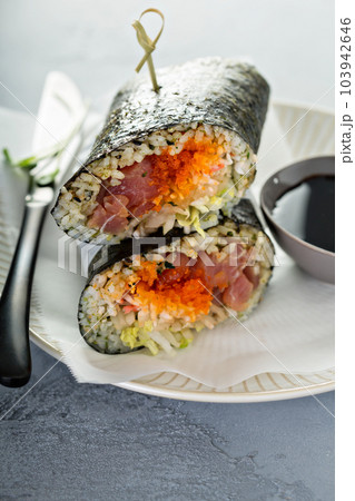Sushi or poke burrito with nori 103942646