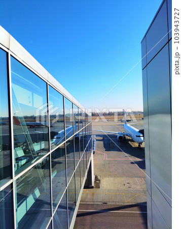 Airport view. Airport apron overview. Aircrafts at the airport gates. Kiev Boryspil International airport. Airport view. Airport apron overview. Aircrafts at the airport gates. Kiev Boryspil International airport. 103943727