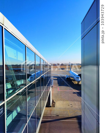 Boryspil, Ukraine - January 31, 2022: Airport panoramic view. Airport apron overview. Aircrafts at the airport gates. Kiev Boryspil International airport. Boryspil, Ukraine - January 31, 2022: Airport panoramic view. Airport apron overview. Aircrafts at the airport gates. Kiev Boryspil International airport. 103943729