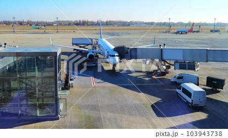 Boryspil, Ukraine - January 31, 2022: Airport panoramic view. Airport apron overview. Aircrafts at the airport gates. Kiev Boryspil International airport. Boryspil, Ukraine - January 31, 2022: Airport panoramic view. Airport apron overview. Aircrafts at the airport gates. Kiev Boryspil International airport. 103943738